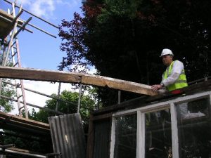 Dismantling the studio roof.