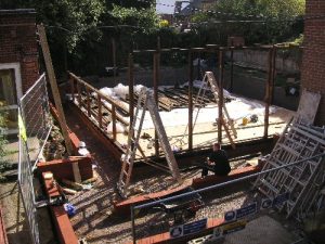 Erecting the timber framework at the Museum site.